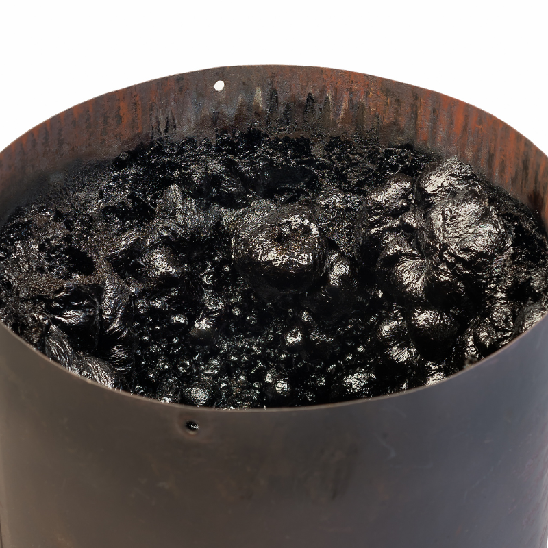 picture of black creosote in a round flue